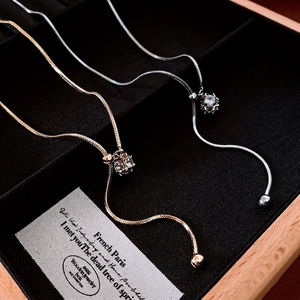 Adjustable gold and silver snake chain necklaces with zircon sphere in a luxury gift box