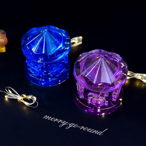 DIY crystal resin carousel music box mold in blue and purple with LED light strings
