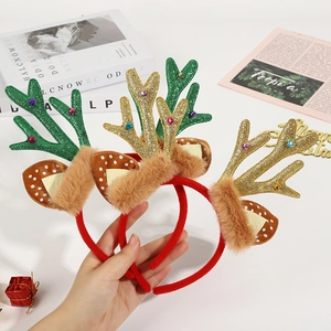 Three festive Christmas reindeer antler headbands with sequins and plush ball decorations