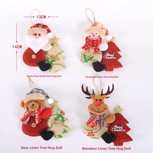 Set of 4 burlap Christmas dolls featuring Santa, Snowman, Bear and Deer with Merry Christmas sign