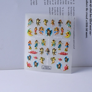 Macro view of 5D embossed nail stickers featuring baroque cherubs and pink roses