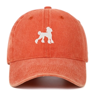 Vintage washed cotton baseball cap in burnt orange featuring white poodle embroidery