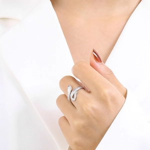 Detailed view of silver snake-shaped adjustable ring featuring intricate scale textures