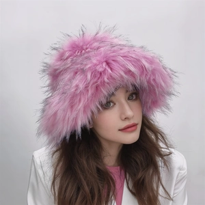 Close-up of fluffy pink faux fur hat texture with soft long plush punk style fibers