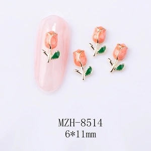 Detailed close-up of colorful tulip nail art charm with 6x11mm dimensions on a pink nail