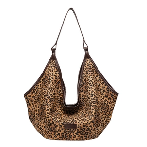 Vintage leopard print large capacity tote bag with brown leather straps on white background