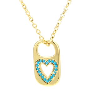 Vintage gold heart pendant with turquoise zircon inlay on an oval capsule shaped charm