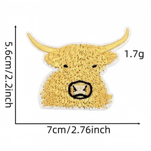 Detailed size view of Highland Cow embroidery patch showing 7cm width and 5.6cm height