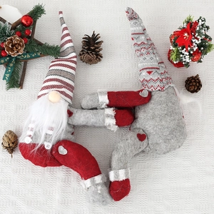 Set of two Christmas gnome curtain tiebacks with striped snowflake hats and faux fur beards