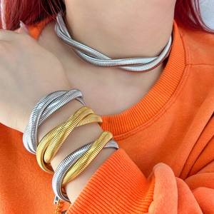 Fashionable braided titanium steel jewelry set featuring silver and gold twist necklaces and bracelets