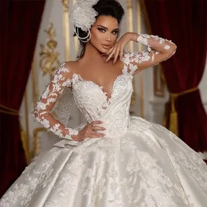 Exquisite lace embroidery and shimmering sequins on a luxury long sleeve bridal gown