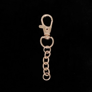 Detail of rose gold lobster clasp with chain link for DIY handmade bag accessories