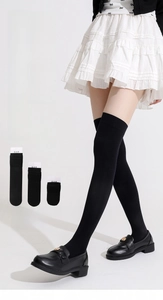 Three lengths of black high-elastic compression socks shown with school uniform and shoes