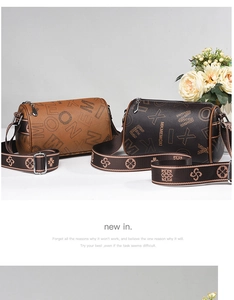Detail of cylinder crossbody bags with monogram print and patterned jacquard straps