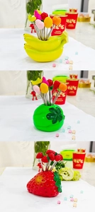 Creative stainless steel fruit forks with strawberry and banana shaped storage bases