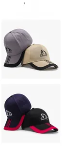 Detailed close-up of embroidered baseball caps with mountain logo and branded webbing