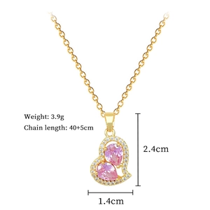 Detail shot of a pink crystal double heart pendant with chain length and size dimensions