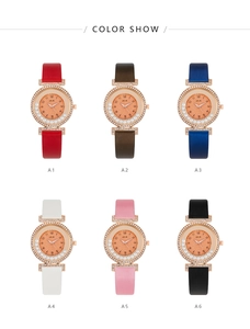 Elegant women's quartz watches featuring sparkling diamonds and colorful leather straps.