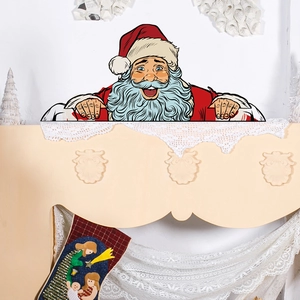 Detail of Santa Claus PVC wall sticker on a mantelpiece with festive holiday decor