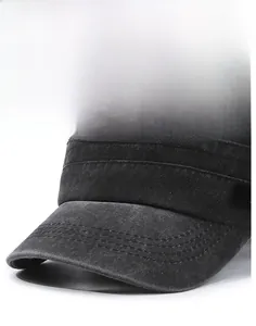 Detail of grey washed cotton military cap featuring leather patch and reinforced stitching