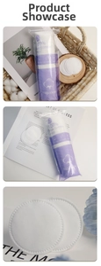 Close-up of 100-count round cotton pads with embossed edges for skincare and makeup removal