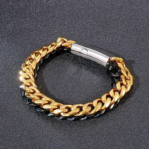 Detailed close-up of Cuban link bracelet featuring mixed gold, silver, and gunmetal finishes