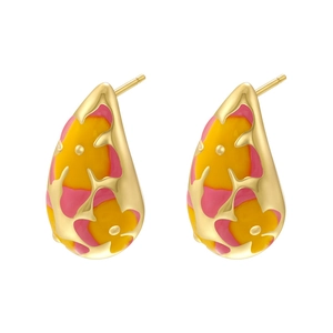 Macro detail of teardrop floral earrings with pink and yellow enamel in gold plating