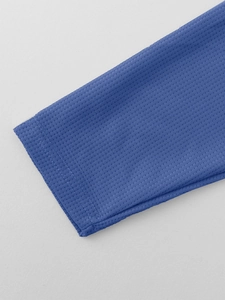 Detail of blue waffle knit texture and clean stitching on men long sleeve cuff