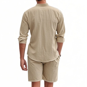 Rear view of men's casual beige linen set showing long-sleeve shirt and shorts