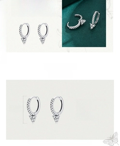 Detail of 925 sterling silver geometric earrings with sparkling zircon stones