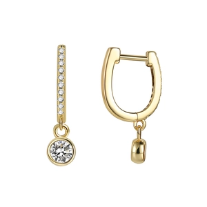 Gold U-shaped hoop earrings with micro-set zircons and a round transparent pendant charm