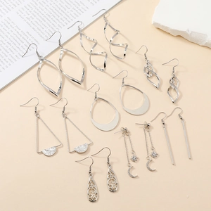 Nine-piece set of silver geometric layered cutout earrings in various trendy shapes