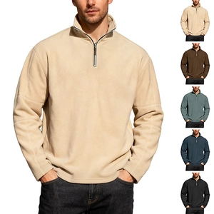 Detail of half-zip fleece sweatshirt showing collar and diverse solid color options