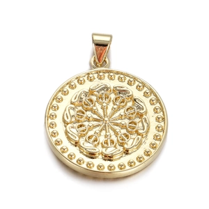 Close-up of golden round metal heart pendant with intricate embossed floral details