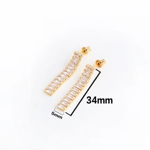 Detail of gold rectangular zircon drop earrings with size markers of 34mm by 5mm