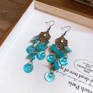 Vintage bohemian bronze drop earrings with layered blue shell petals and floral hollow motifs