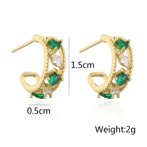 Detail view of 18K gold plated C-shaped earrings with green zircons and size dimensions