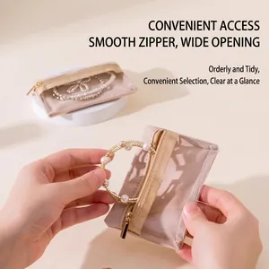 Portable beige velvet jewelry pouch with clear window and smooth metal zipper for travel