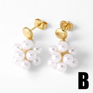 Detailed view of elegant white pearl flower stud earrings with 18k gold plating style B