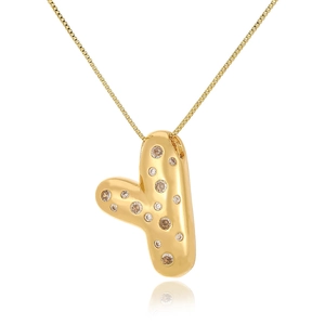 Macro view of 18k gold plated chunky heart pendant with shiny cubic zirconia inlay