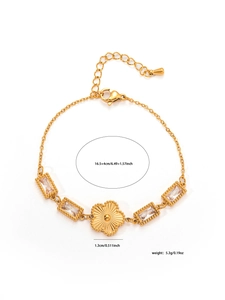 Macro detail of French vintage titanium steel gold flower bracelet with zircon stones