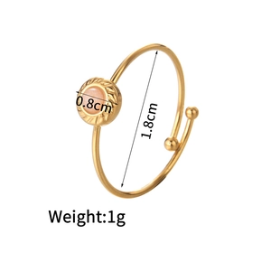 Detailed close-up of 14K gold plated stainless steel ring with pink natural stone inlay