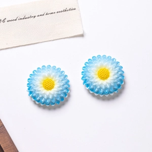 Detailed macro shot of dual-tone blue and white resin daisy craft accessories