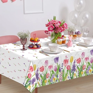 Floral table cover with spring tulip print set for a festive birthday party scene
