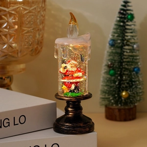 Christmas candle snow globe lamp with Santa Claus figure and gold glitter inside