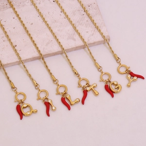 Golden twist chain bracelet with crystal letter pendant and red chili charm for women