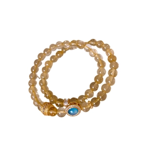 Elegant double-layer rutilated quartz beaded bracelet with blue oval zircon pendant