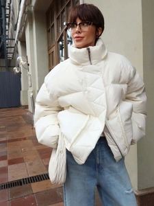 Women's cream white padded puffer jacket with high collar and quilted warm texture