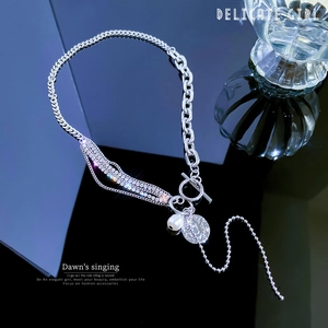 Silver multi-layer necklace with pearls, coin pendant and rhinestones on black reflective base