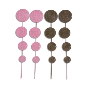 Bohemian geometric round spiral textured earrings in pink and brown with silver pins